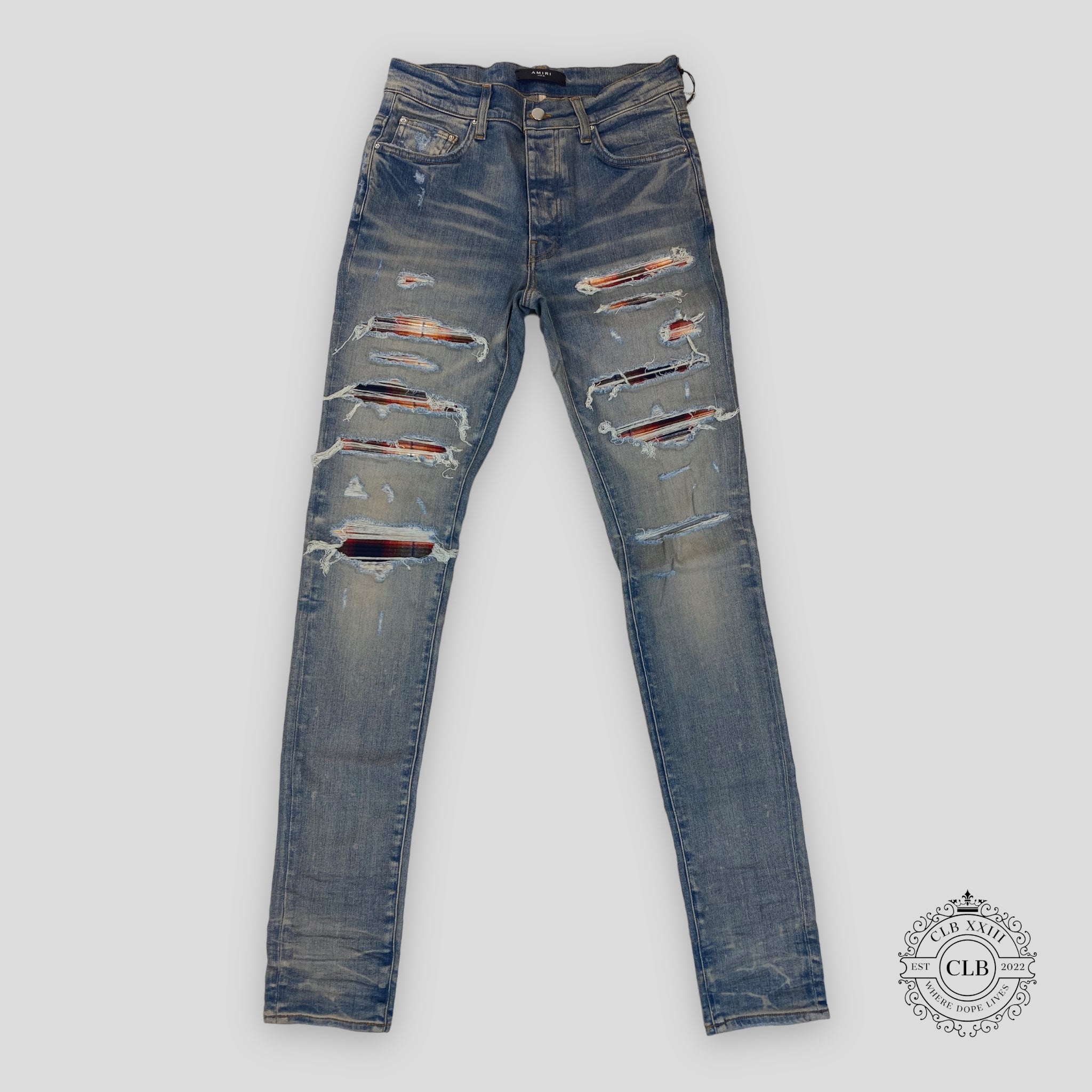 AMIRI PLAID THRASHER JEANS - CLAY INDIGO