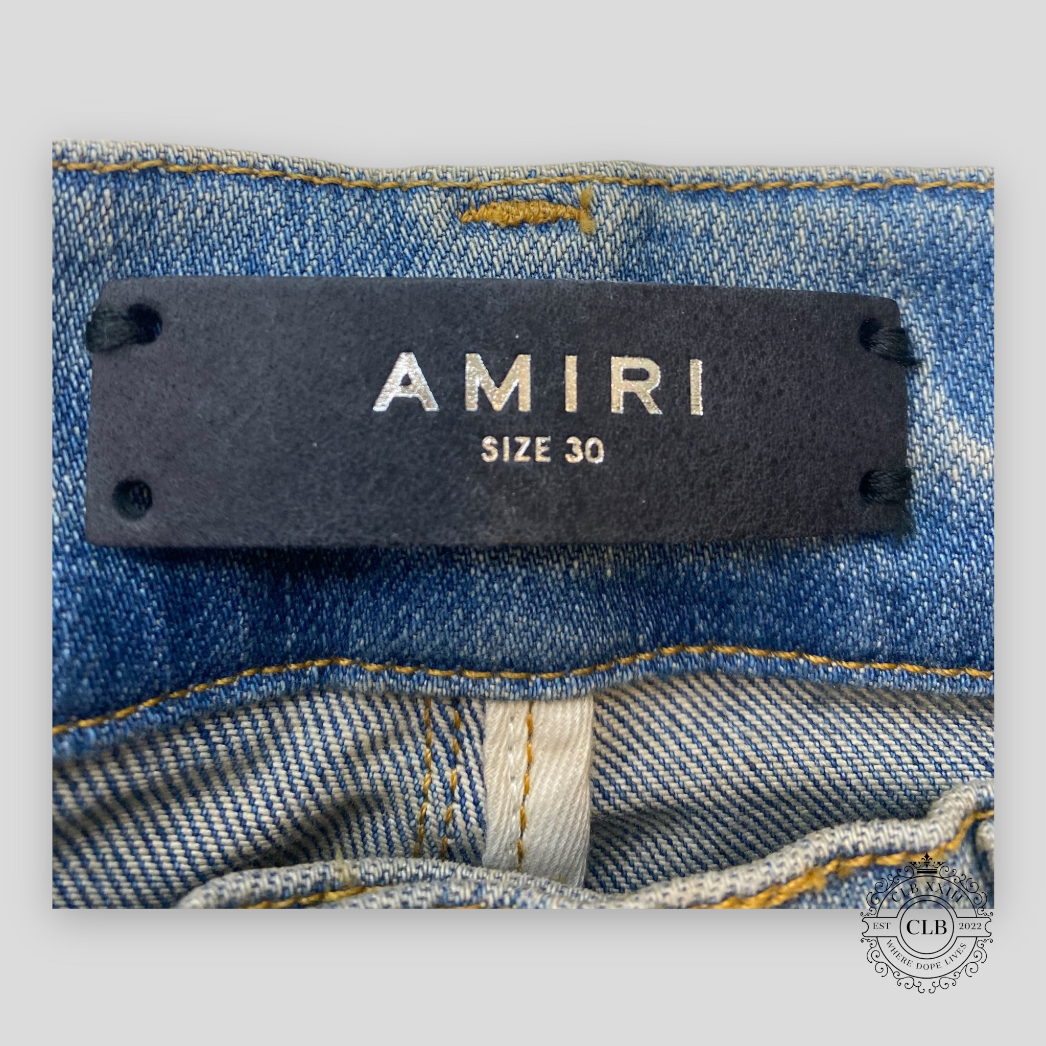 AMIRI PLAID THRASHER JEANS - CLAY INDIGO