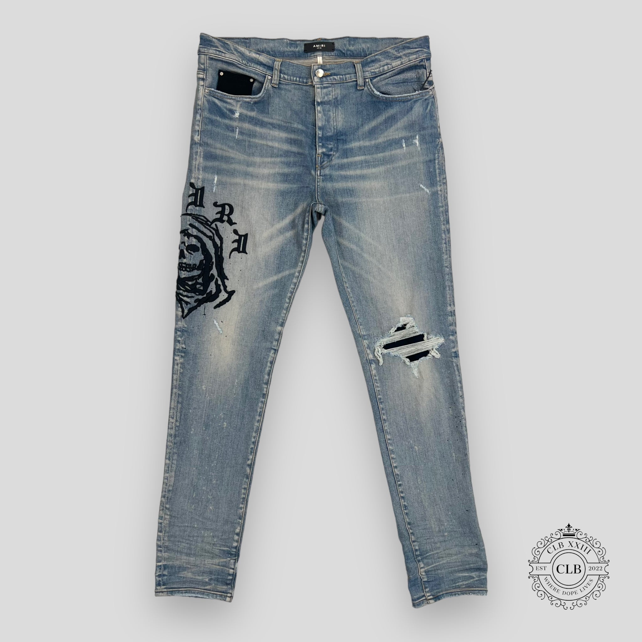 AMIRI X WES LANG REAPER LOGO JEANS - CLAY INDIGO